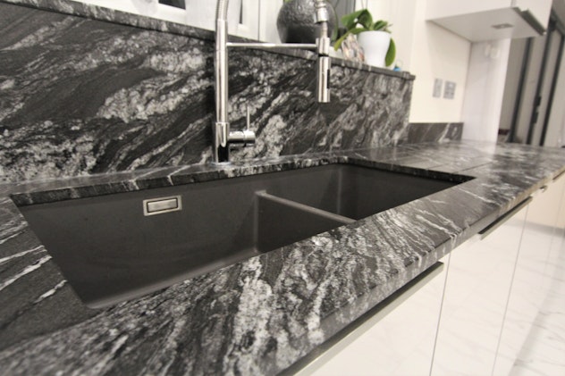 SENSA  worktop with German kitchen from Hampdens kitchens and bedrooms