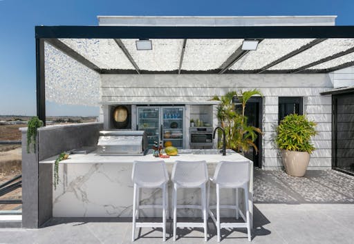 House with Aura Outdoor Kitchen