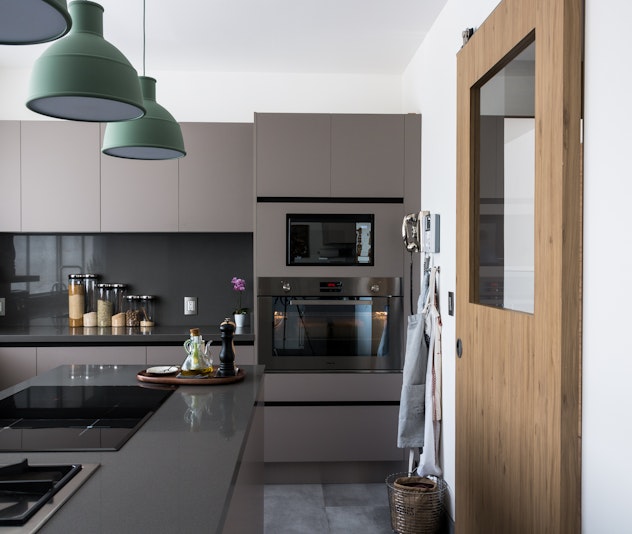 Elegant monochrome kitchen by Vitelier