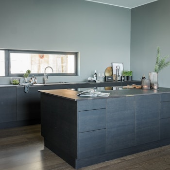 Modern grey tones in this Norwegian kitchen