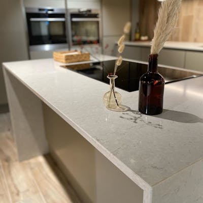 Fresh beige minimalistic kitchen with marbled Silestone  Snowy Ibiza